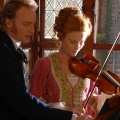 Gerda and The Lieutenant playing passionate duos on the violins